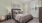 Bedroom with natural lighting and high ceilings