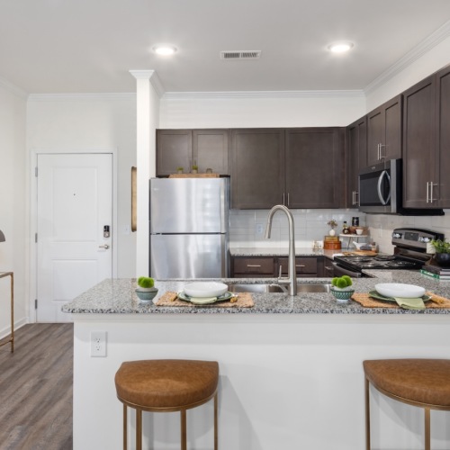 Beautiful kitchens with designer finishes Well-lit kitchen with ample counter space