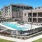 Resort-style swimming pool with a fence